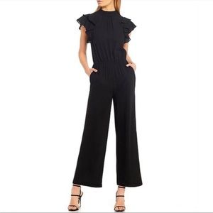 1. STATE Flutter Sleeve Mock Neck Ruffle Jumpsuit in Rich Black Extra Small